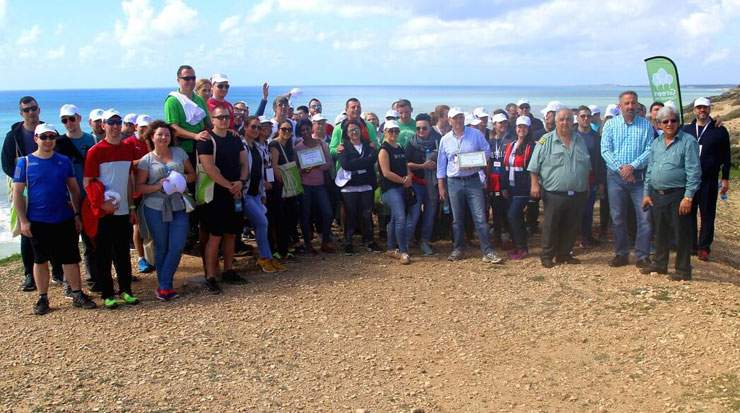 Boston Scientific Corporation employees at Petra Tou Romiou shore supporting the ecological movement